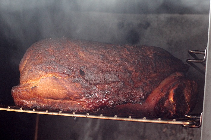 Pork Shoulder roast smoking in veritcal Smoker