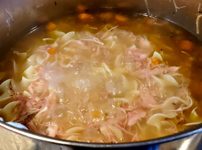 Smoked Turkey Noodle Soup Cooking in stockpot