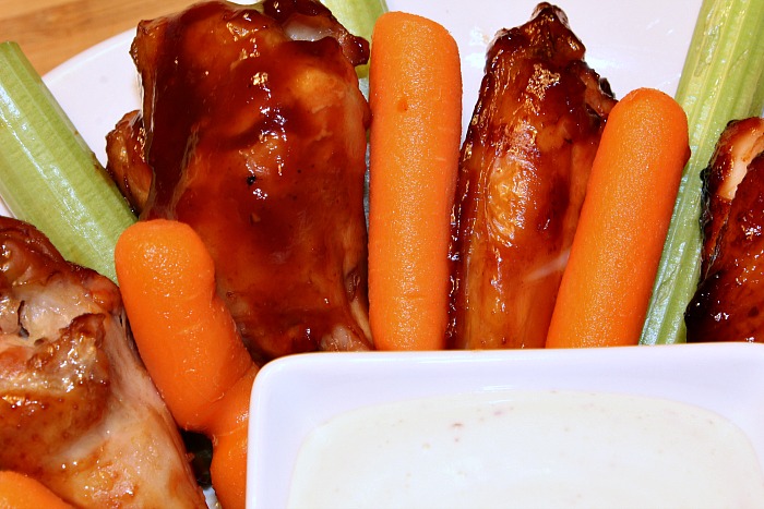 Smoked BBQ Coke Wings Served With Carrots And Celery 