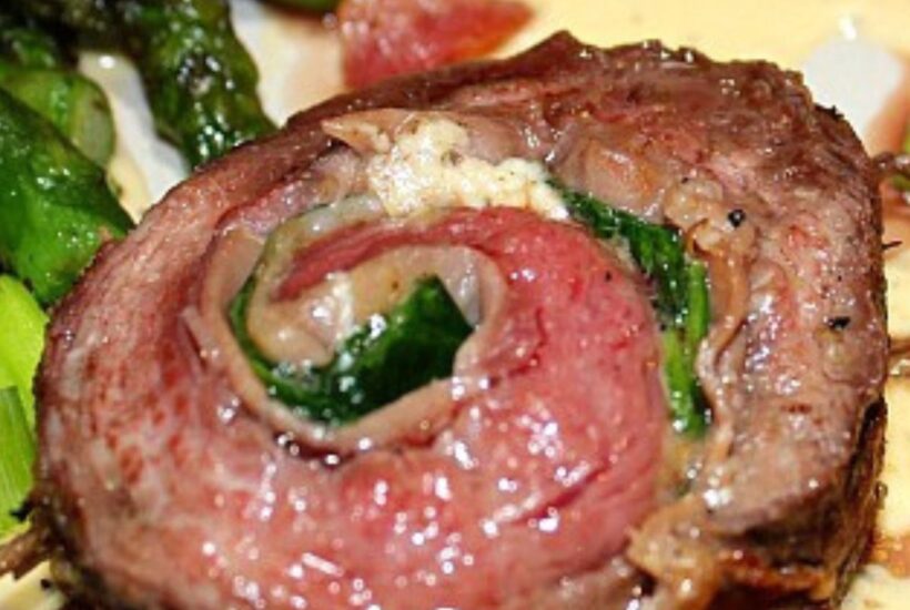 Grilled Flank Steak Pinwheel served on a plate