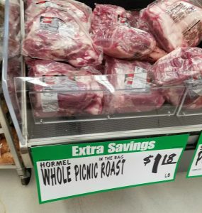 Pork Shoulder roast in a grocery case