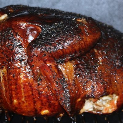 This Smoked Turkey Recipe And Dry Rub Recipe is perfect for any holiday dinner or just a weekend feast! Leftover smoked turkey is perfect for other dishes.