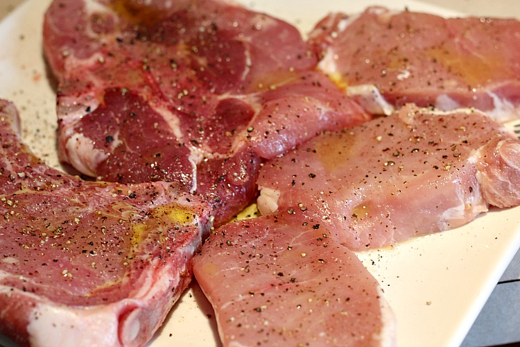 Pork Chops seasoned with salt and pepper