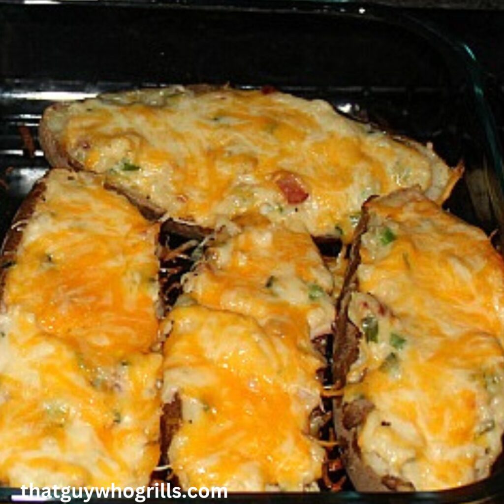 Twice Baked Loaded Baked Potatoes In Casserole Pan on Grill