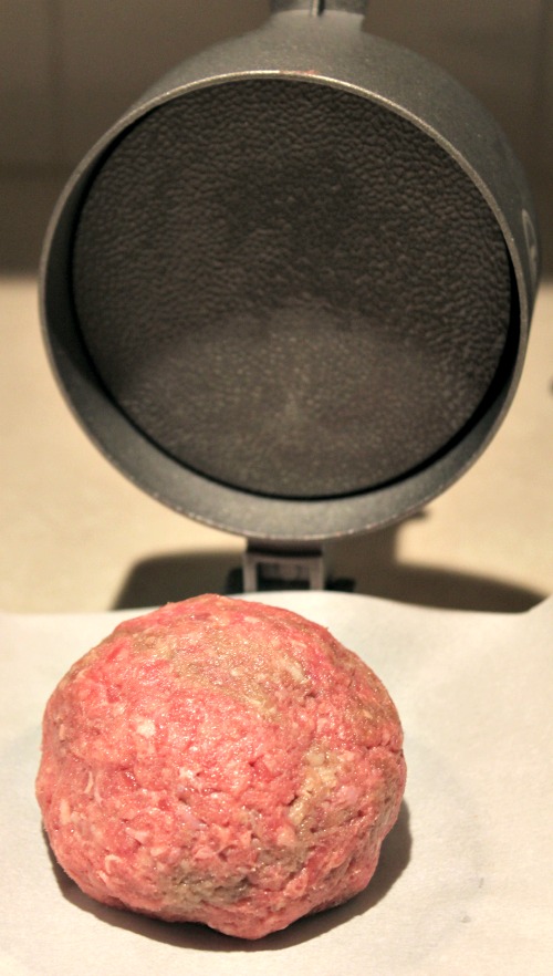 Oiled Burger Press With Ball Of Hamburger