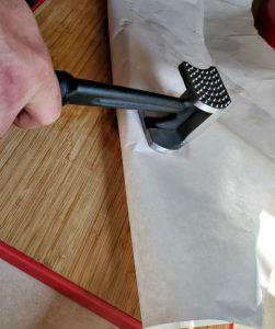 Meat Tenderizing pounding steak for steak fajitas