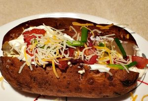 Smoke Baked Potatoe made fully loaded