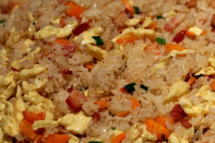 How To Make Hibachi Fried Rice on a Blackstone Griddle. This is easy to do with any meat and choice veggies and taste just as good as a Japanese Steakhouse.