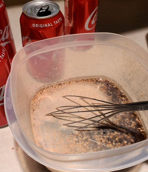 Coca Cola Brine Ingredients being mixed in a container 