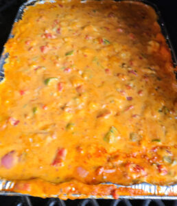 This Pit Boss Smoked Queso Dip Recipe is perfect for Taco Tuesday, Cinco De Mayo, or Nacho night! Use Velveeta cheese, pepper jack, Rotel, cheddar cheese, chorizo, jalapeno, and other add-ins!! This turns out creamy and flavor for an amazing appetizer.