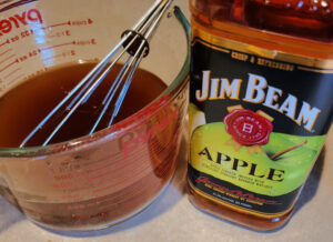 Jim Beam Apple Bourbon By Pryex measuring glass for mixing meat injection