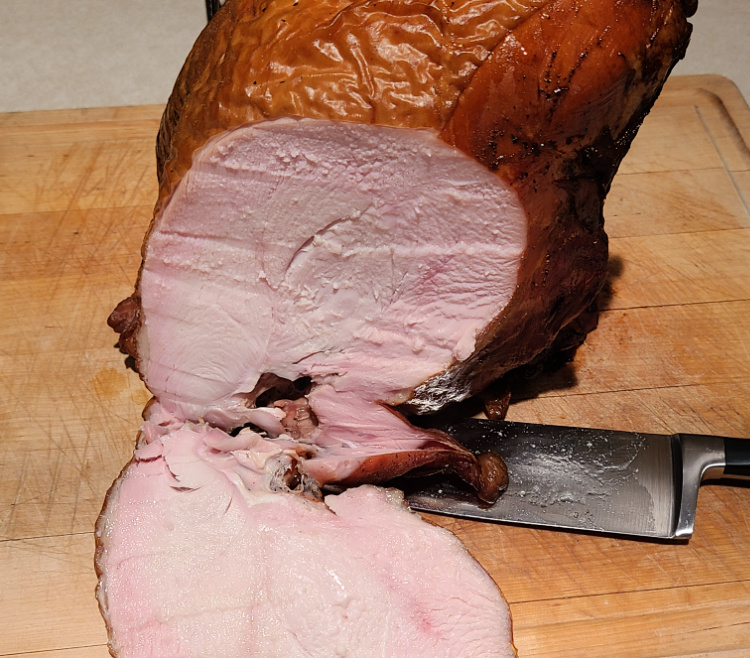 Sliced Turkey Breast on Cutting Board