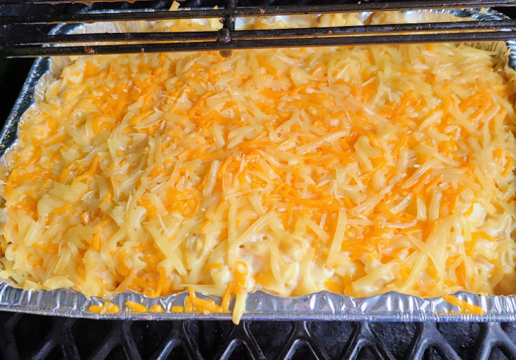 This Smoked Macaroni And Cheese is the perfect side dish to smoke for dinner! Use your cheese blend to make this creamy homemade macaroni and cheese! Gouda, cheddar, parmesan, or any cheese can be used to make this dish! Smoke low and slow on your Pitboss smoker or any pellet grill.