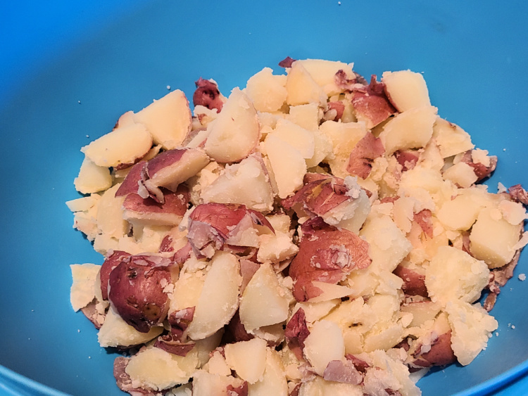 Smoked Cheesy Potatoes Recipe is the perfect side dish to make while smoking any meat! The bacon and cheese are the perfect complements to the potatoes! Use red potatoes, a mixture of cheese, and your favorite bacon. Plus you can add in jalapeno peppers as well.