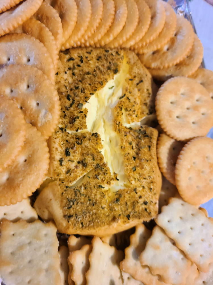 How To Make Smoked Cream Cheese on the Pit Boss! This is such an easy way to make a dip or add flavor to another recipe as well! You can use a variety of spices to change the flavor. This can be eaten as is, on bagels, with crackers, or mixed into chowders or other dips. 