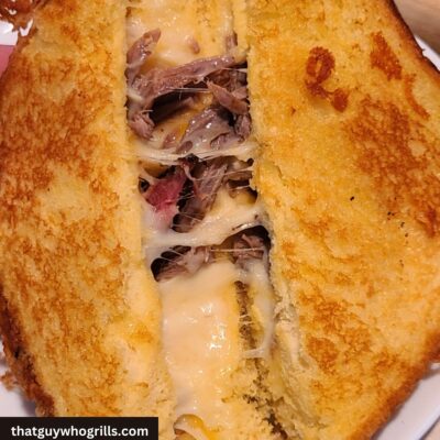 Blackstone Brisket Grilled Cheese Being pulled open