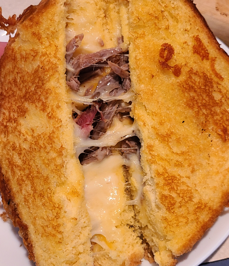 Brisket Grilled Cheese On The Blackstone Griddle is an amazing leftover brisket recipe! Using smoked brisket adds an amazing flavor to grilled cheese! Either use shredded brisket or brisket slices to make these. You can add different cheeses to change up the flavor like Monterey Jack or Pepper Jack cheese!