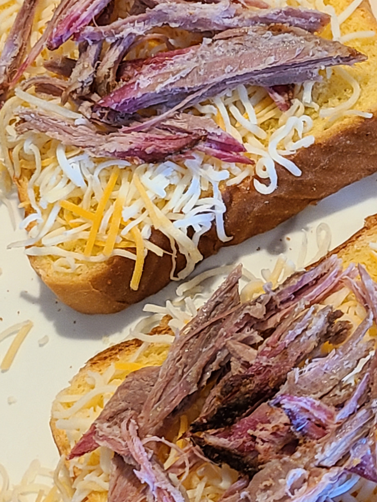Brisket Grilled Cheese On The Blackstone Griddle is an amazing leftover brisket recipe! Using smoked brisket adds an amazing flavor to grilled cheese! Either use shredded brisket or brisket slices to make these. You can add different cheeses to change up the flavor like Monterey Jack or Pepper Jack cheese!