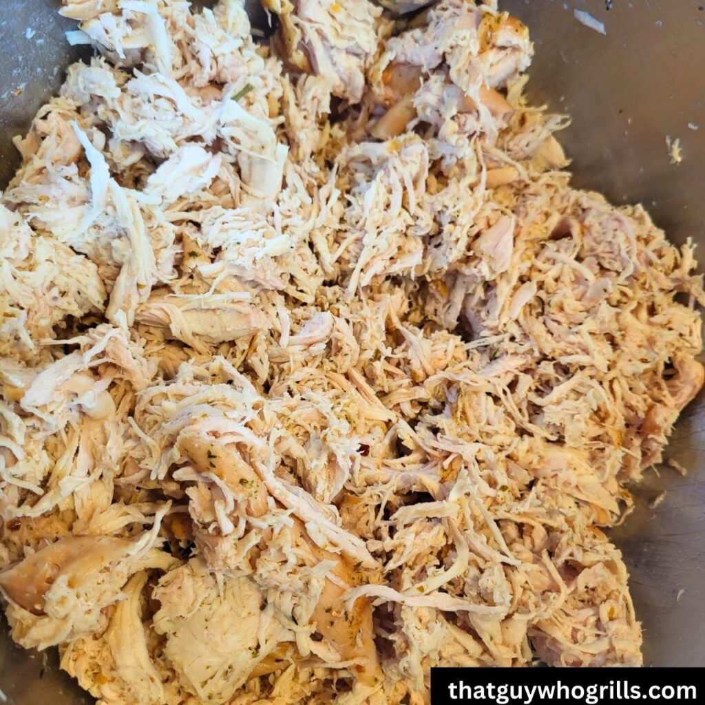 shredded Smoked chicken in mixing bowl
