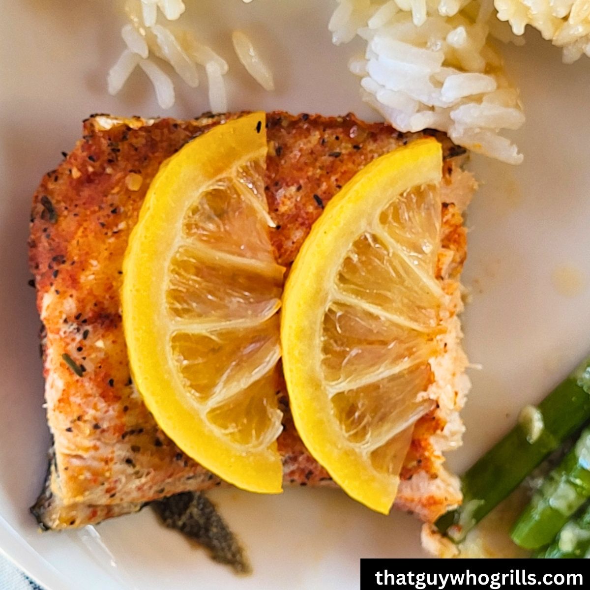 Foil packet grilled salmon served with a lemon slice