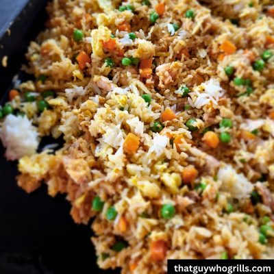 Smoked Salmon Fried Rice Cooking on a Blackstone Griddle
