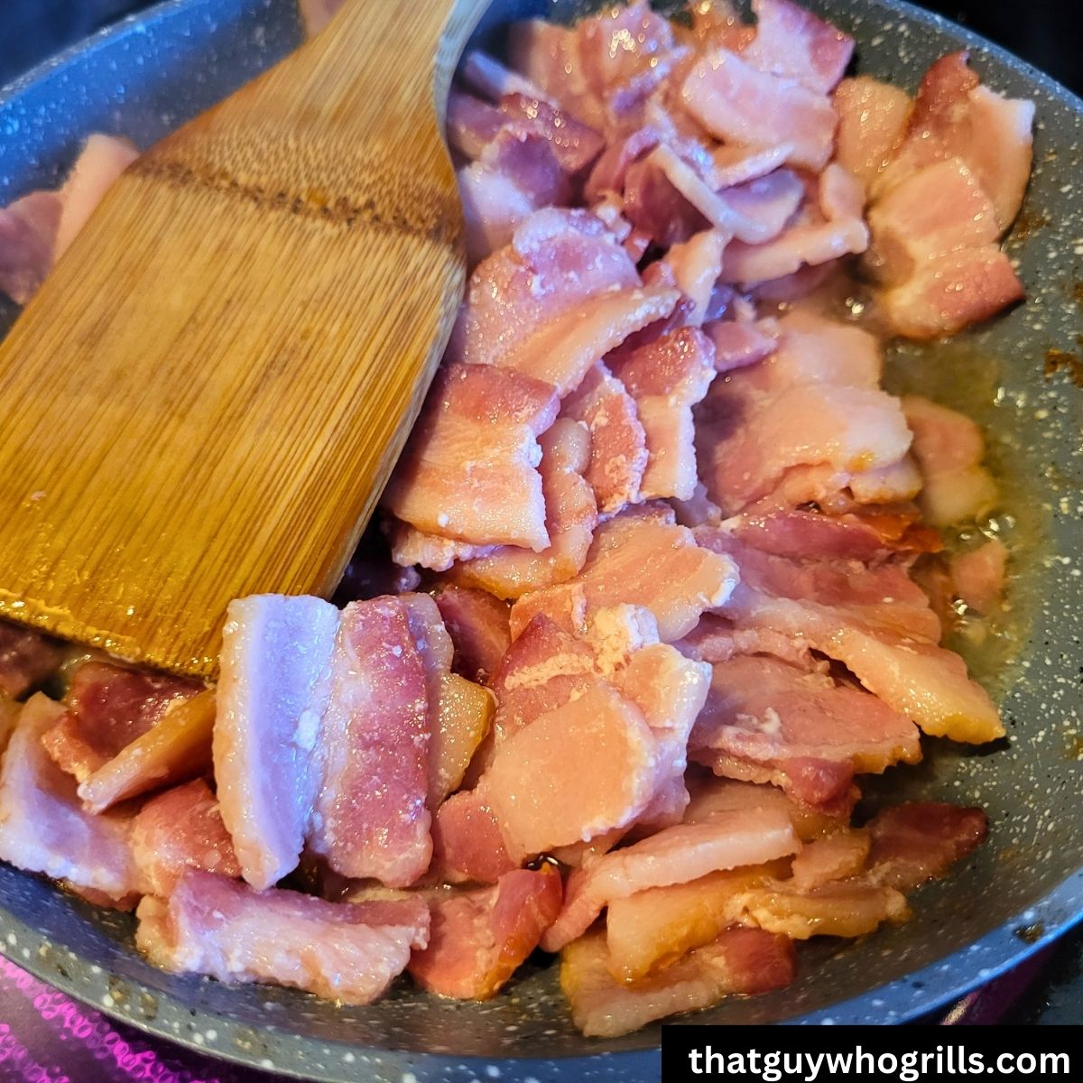 bacon sauting in a fry pan for salmon chowder