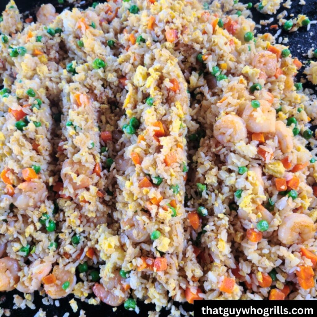 Shrimp Fried Rice Cooking on Blackstone Griddle
